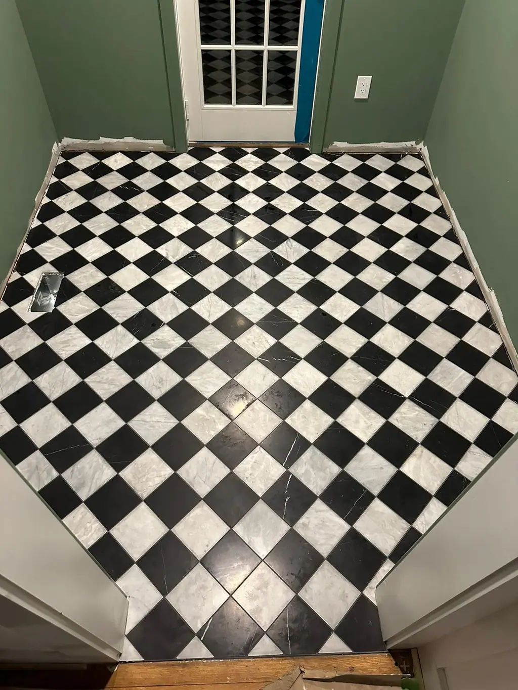 Black and white checkerboard marble floor